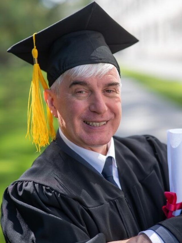 [freepicdownloader.com]-portrait-man-wearing-graduation-gown-normal